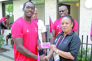 Burns elated to carry T&T flag