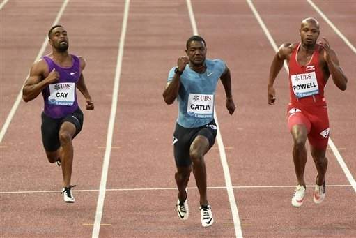 Gatlin shoots down Powell, Gay in 9.75