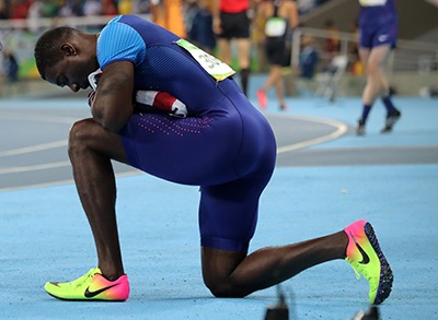 Gatlin loses out on gold, gets booed too