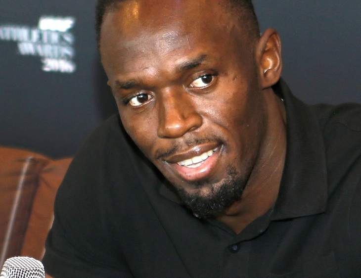 A national treasure - Jamaica PM praises Usain Bolt at film premiere