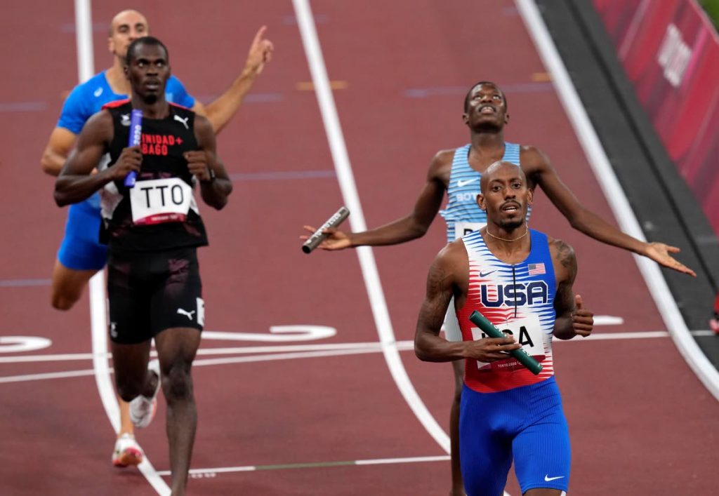 Tokyo Olympics : Dwight St Hillaire (sec left) and Vernon Norwood USA men's 4x400m semi