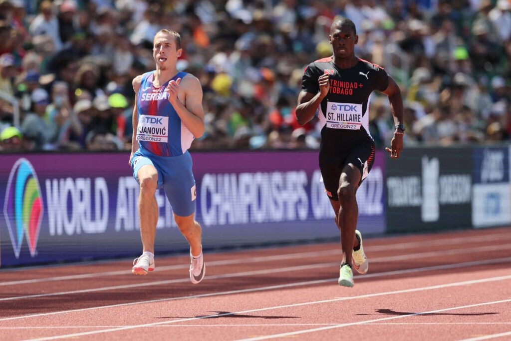 World Athletics Championships Oregon USA : Dwight St. Hillaire behind Serbia's Bosko Kijanovic, 400m heat